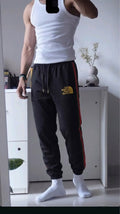 Apex Gold Emblem Joggers Black - Under Attack
