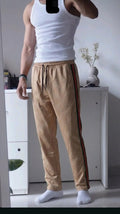 Heritage Monogram Track Pants - Under Attack